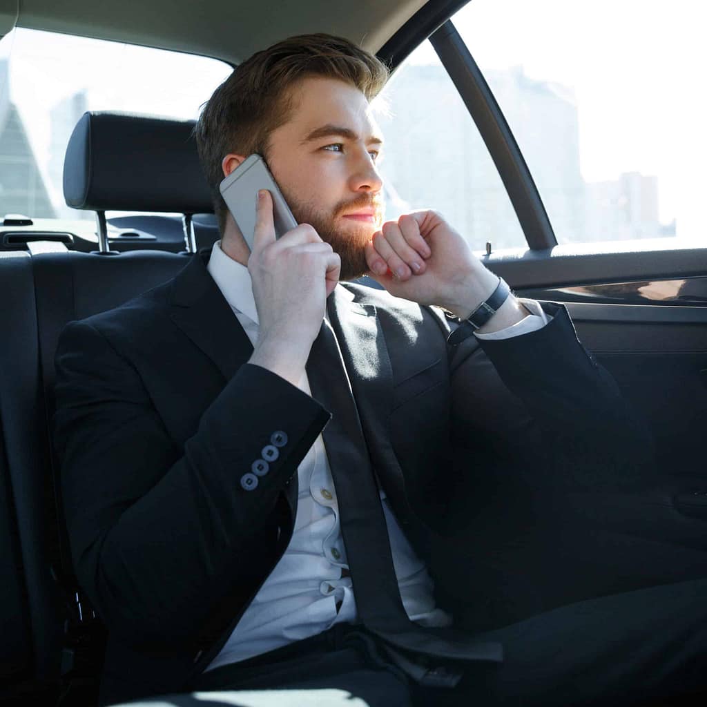 business man on phone in GoRa Taxis